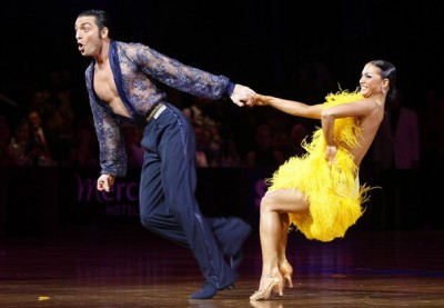 Italy's Stefano Di Filippo (L) and Anna Melnikova perform the honour dance after winning the World Latin Championship in Melbourne December 14, 2008. The International Dance Sport Federation (IDSF) World Latin Championship is a prestigious dance competition with an estimated 220 dancers from more than 60 countries competing. REUTERS/Mick Tsikas     (AUSTRALIA)